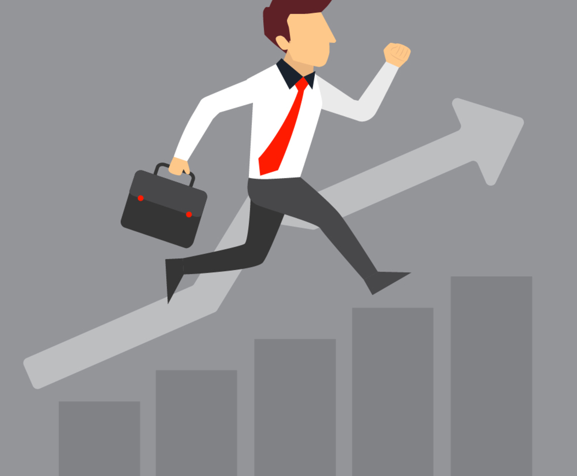 Businessman running over the graph