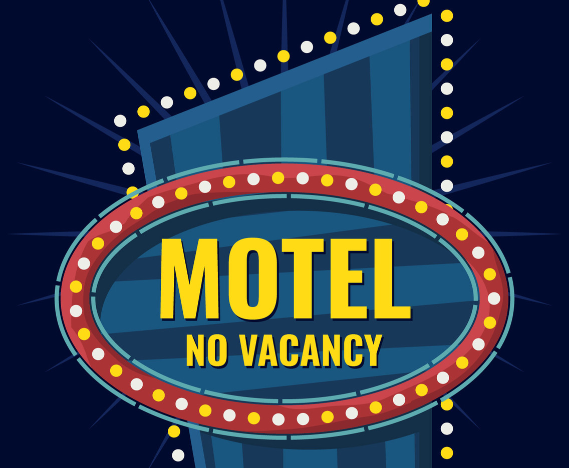 retro sign lighting up at night