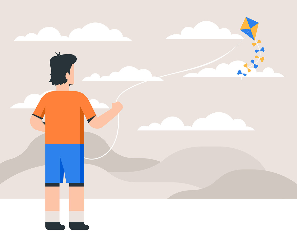 People Flying A Kite