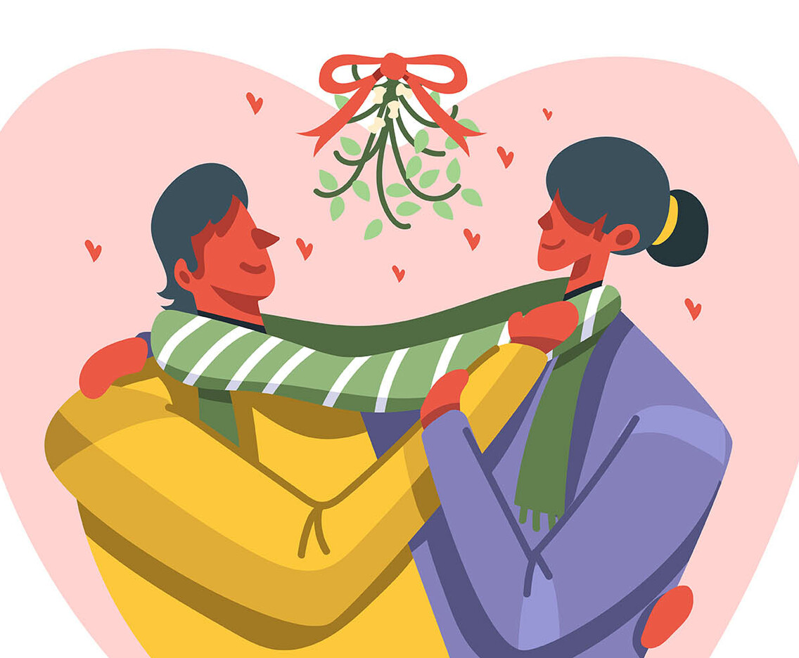 Couple Standing under Mistletoe