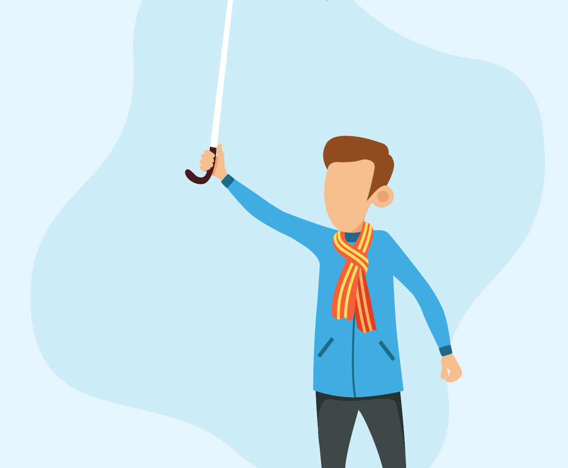 A boy holding umbrella