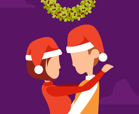 Love couple standing under mistletoe