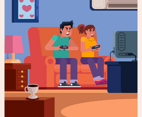Couple On Couch Playing Games