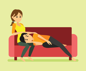 A man laying on her girlfriend thigh