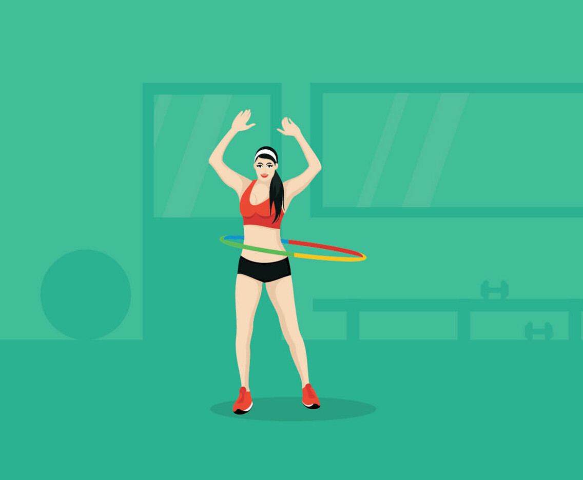 Beautiful Woman Exercising With Hula Hoop